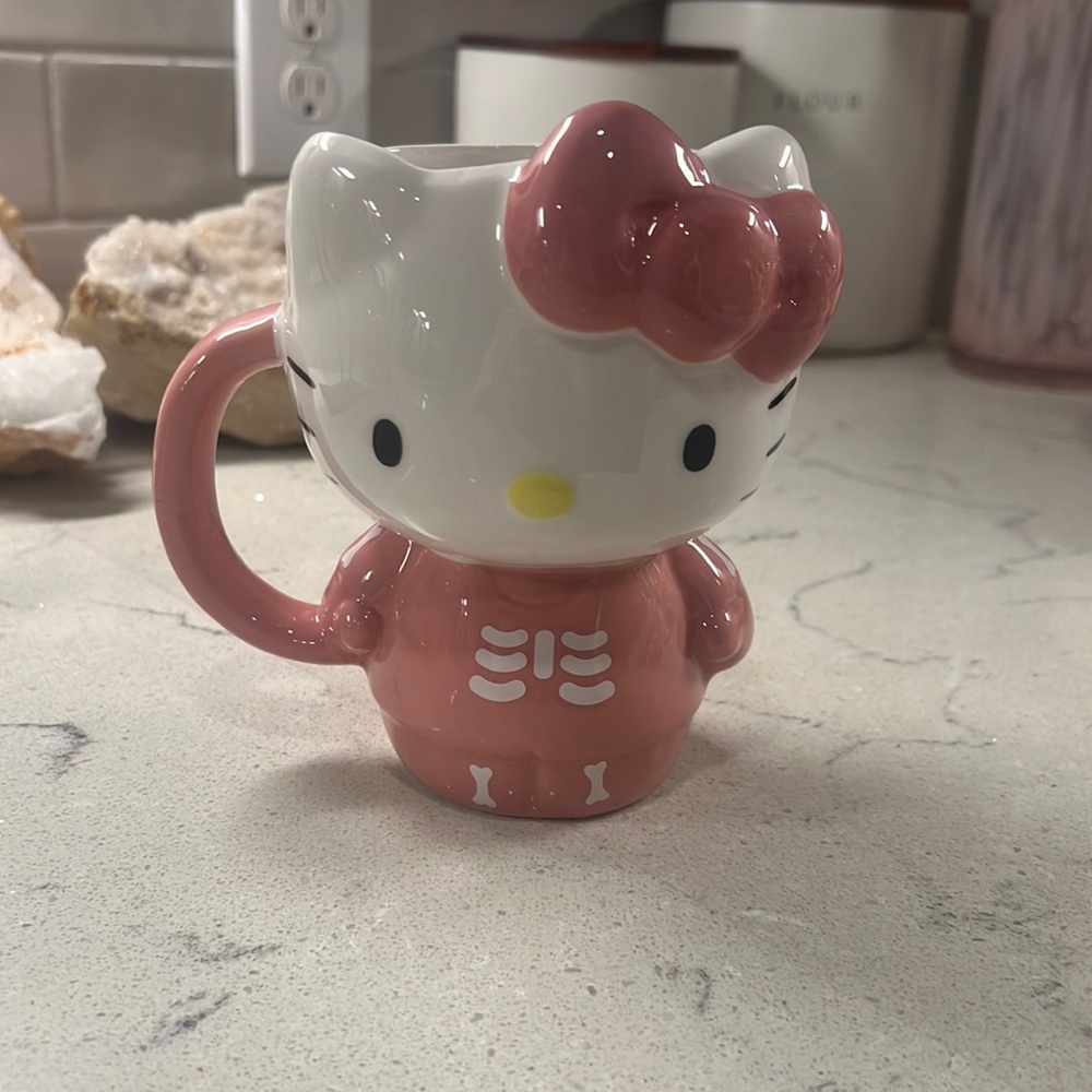 Hello Kitty pink skeleton mug